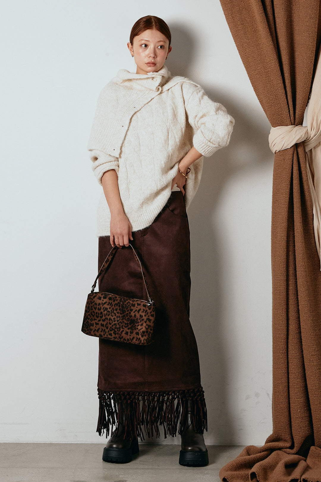 [SET]ケープデザインケーブルニットトップス+スウェードライク裾フリンジスカート(2set)