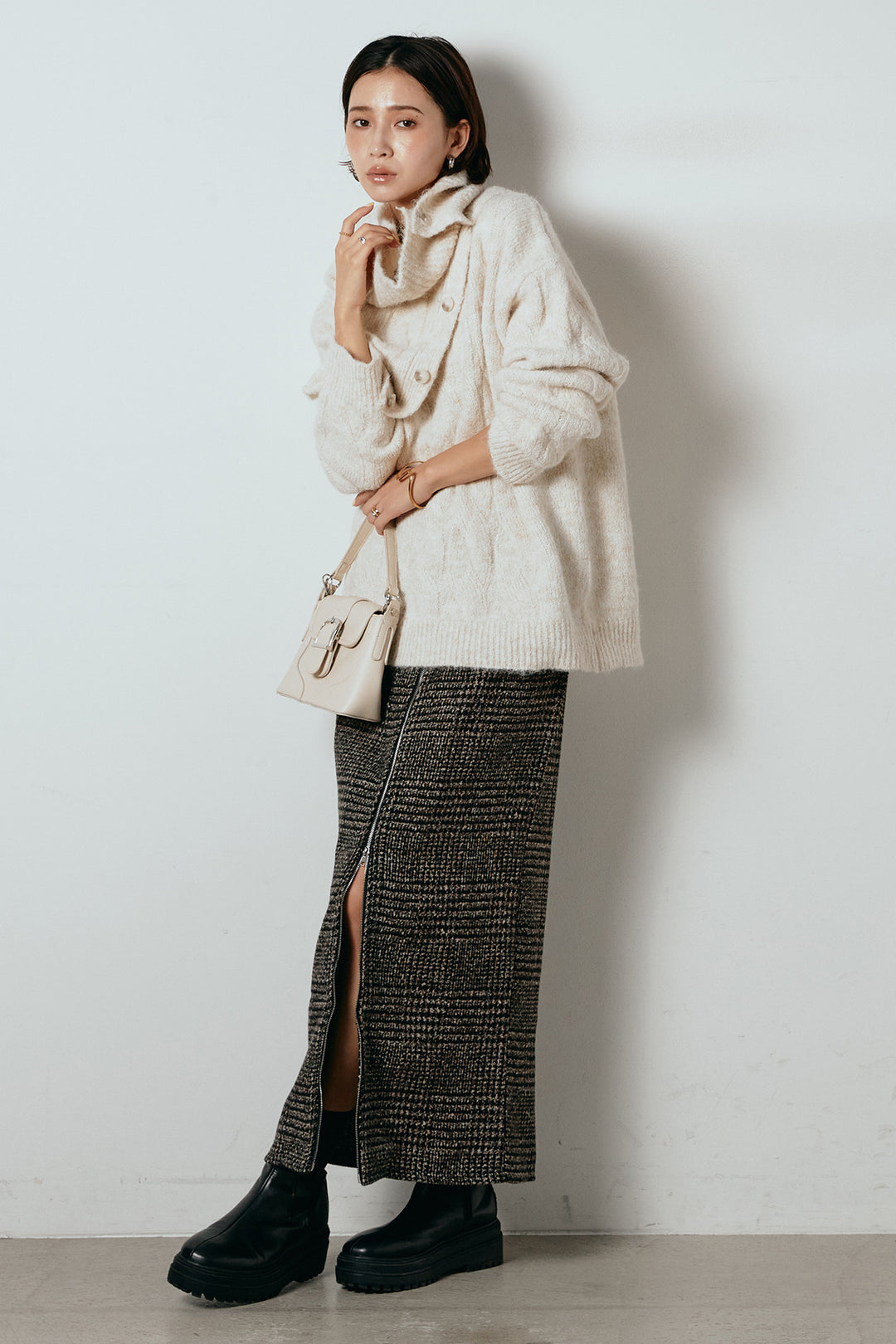 [SET]ケープデザインケーブルニットトップス+グレンチェック柄フロントジップタイトスカート(2set)