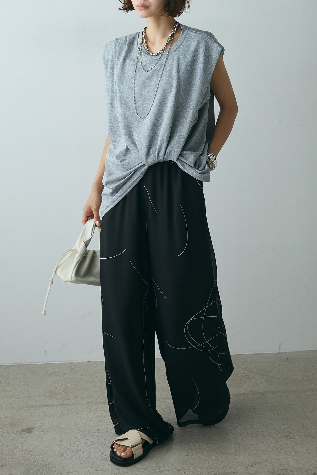 [SET]ノースリーブフロントツイストTシャツ+ニュアンスライン柄ワイドパンツ(2set)