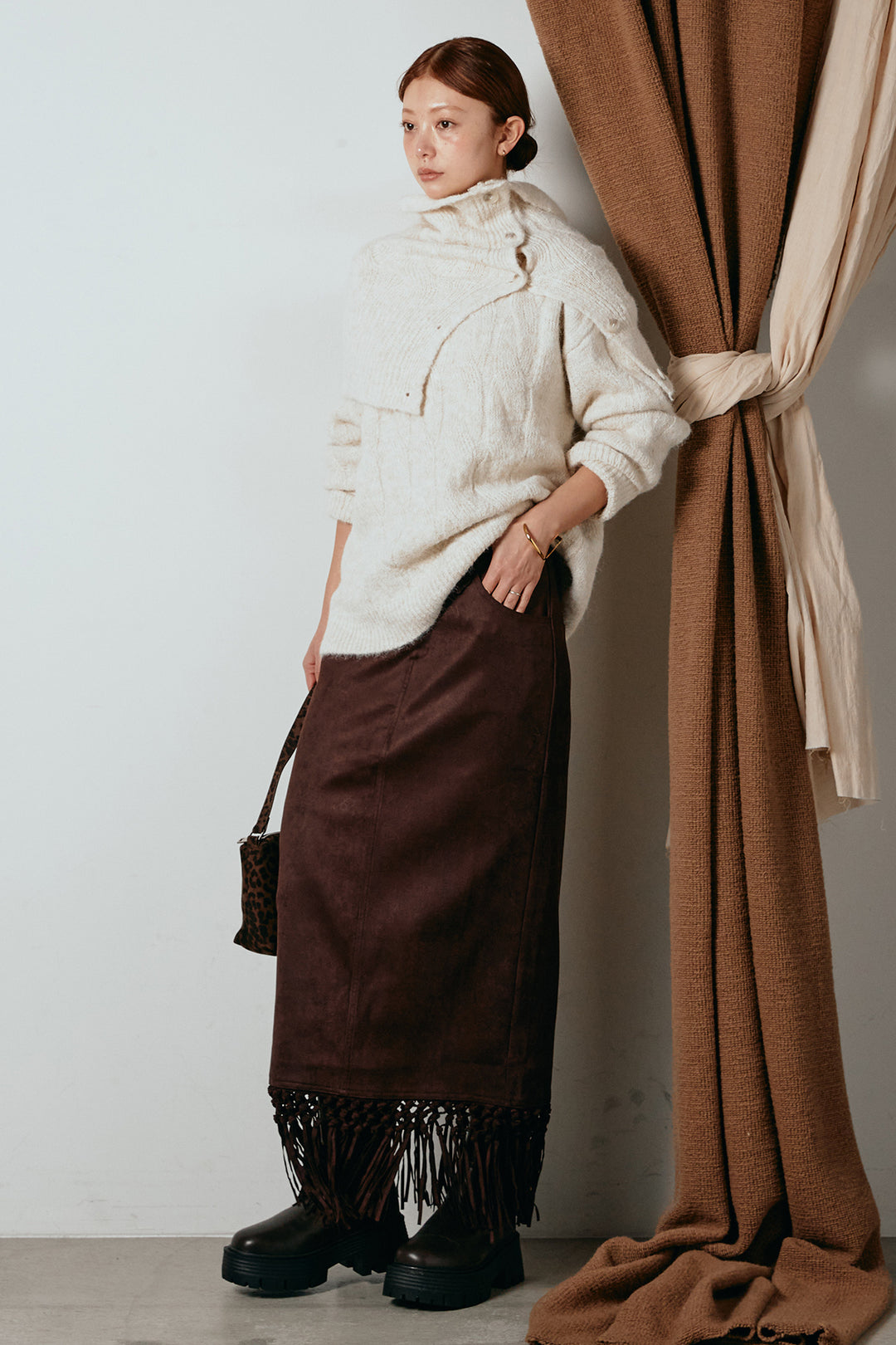 [SET]ケープデザインケーブルニットトップス+スウェードライク裾フリンジスカート(2set)