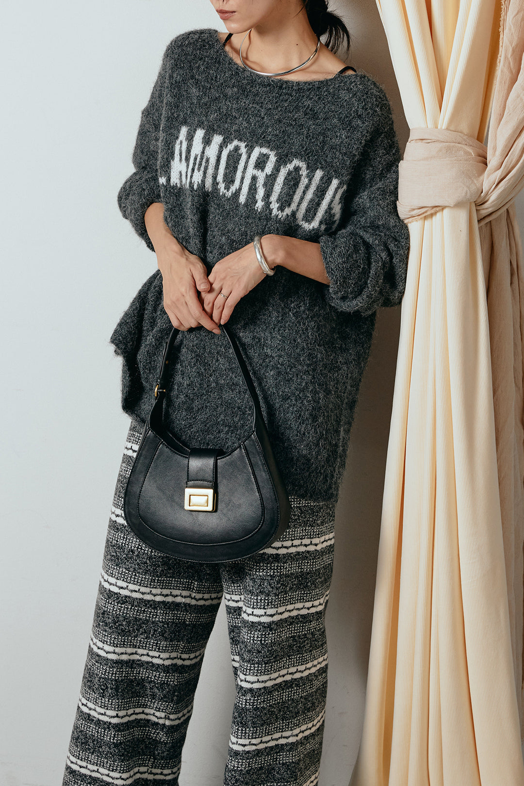 [SET]フロントロゴデザインニットトップス+マルチライン柄リラックスニットパンツ(2set)