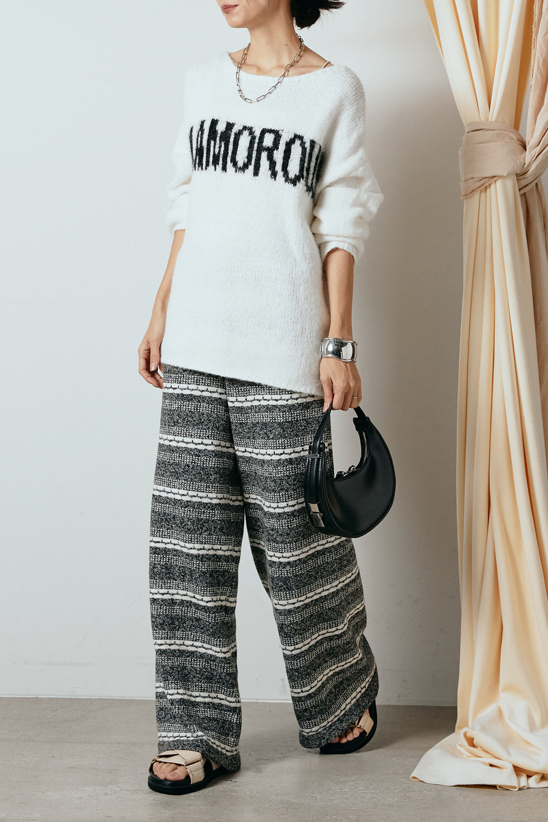 [SET]フロントロゴデザインニットトップス+マルチライン柄リラックスニットパンツ(2set)