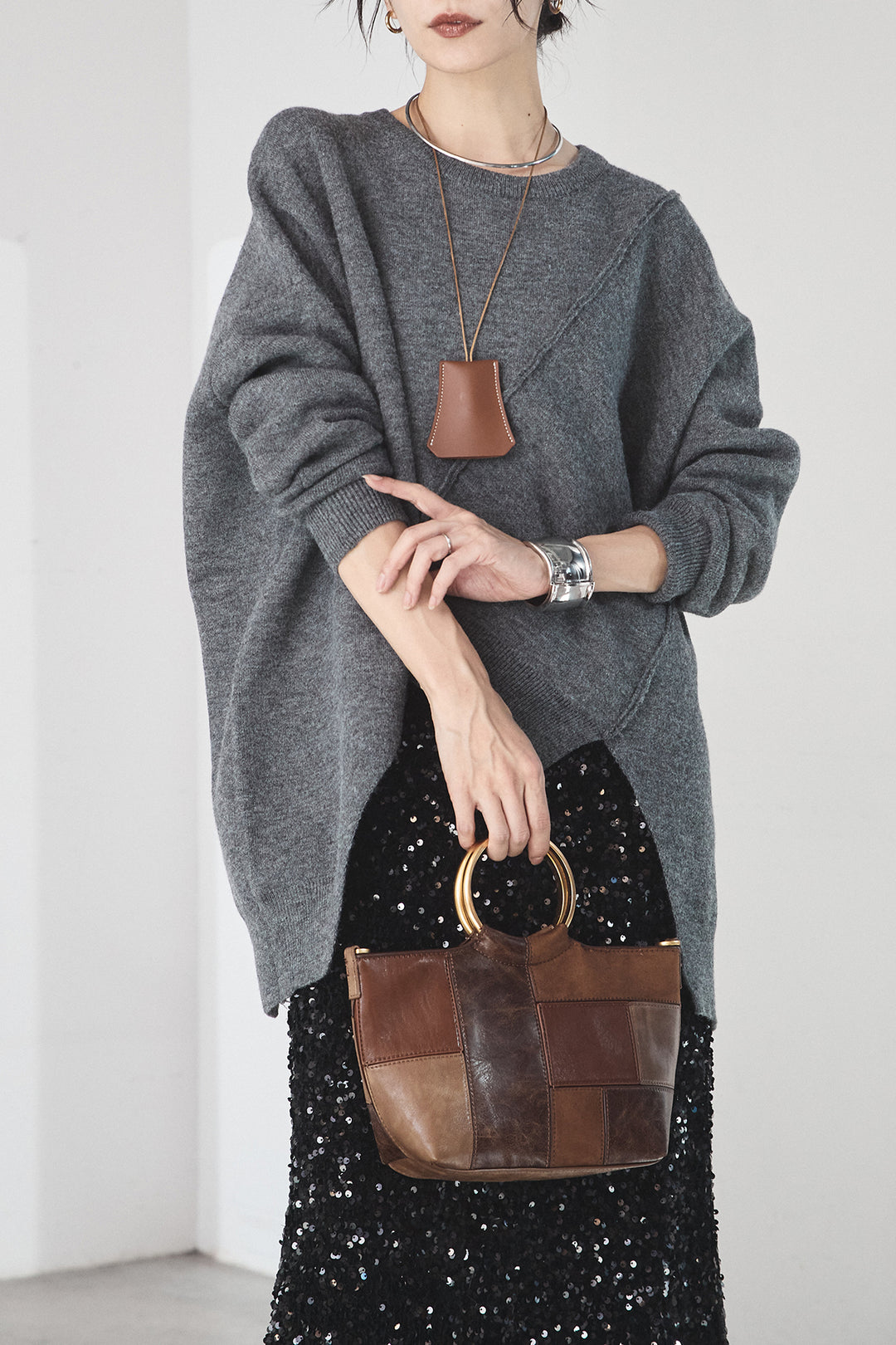 [SET]アシンメトリーデザインニットトップス+スパンコールニットワイドスカート(2set)