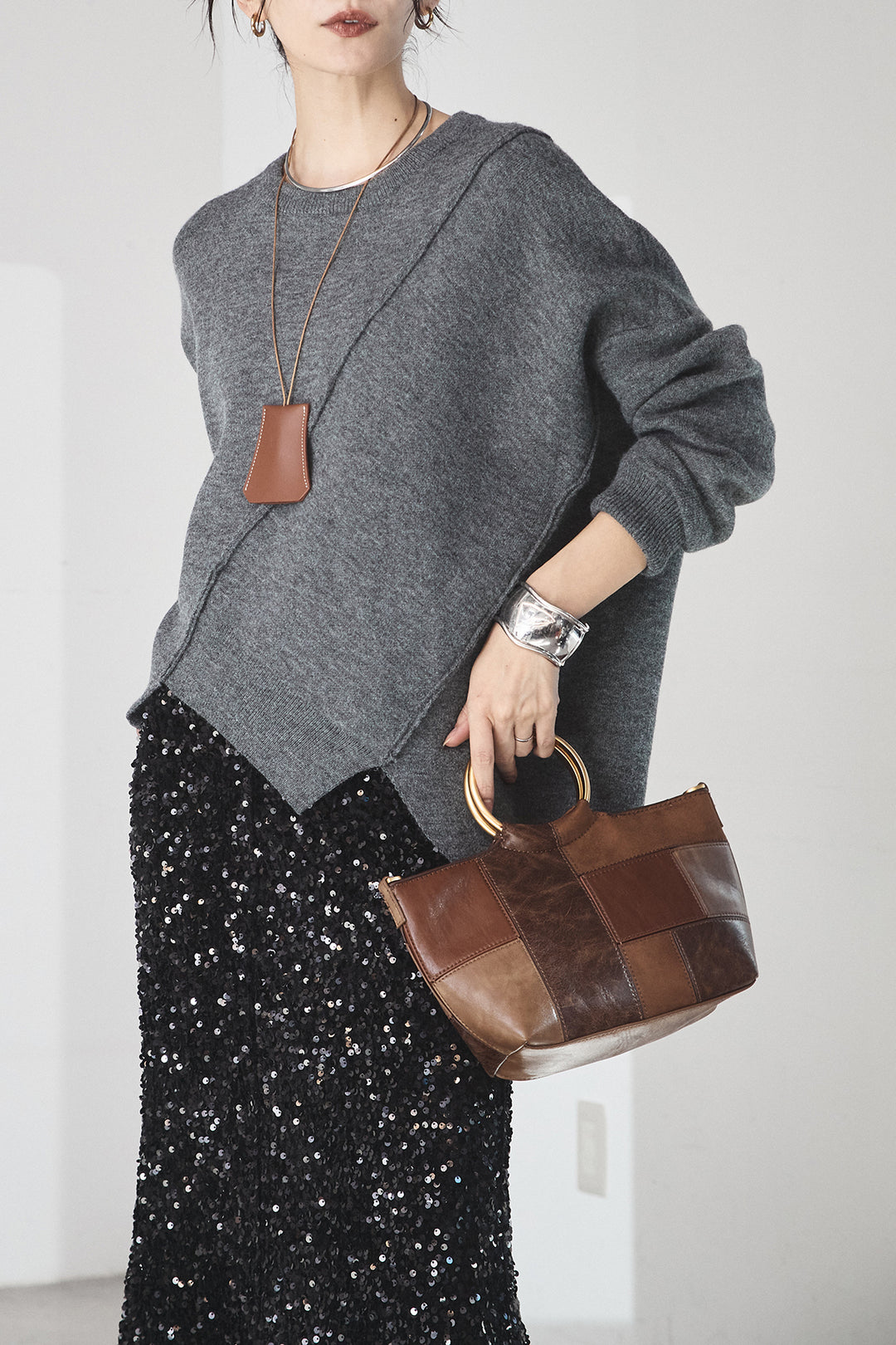 [SET]アシンメトリーデザインニットトップス+スパンコールニットワイドスカート(2set)