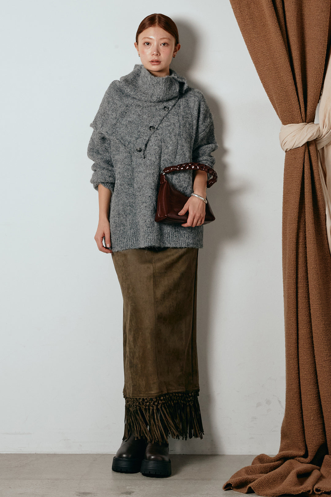 [SET]ケープデザインケーブルニットトップス+スウェードライク裾フリンジスカート(2set)