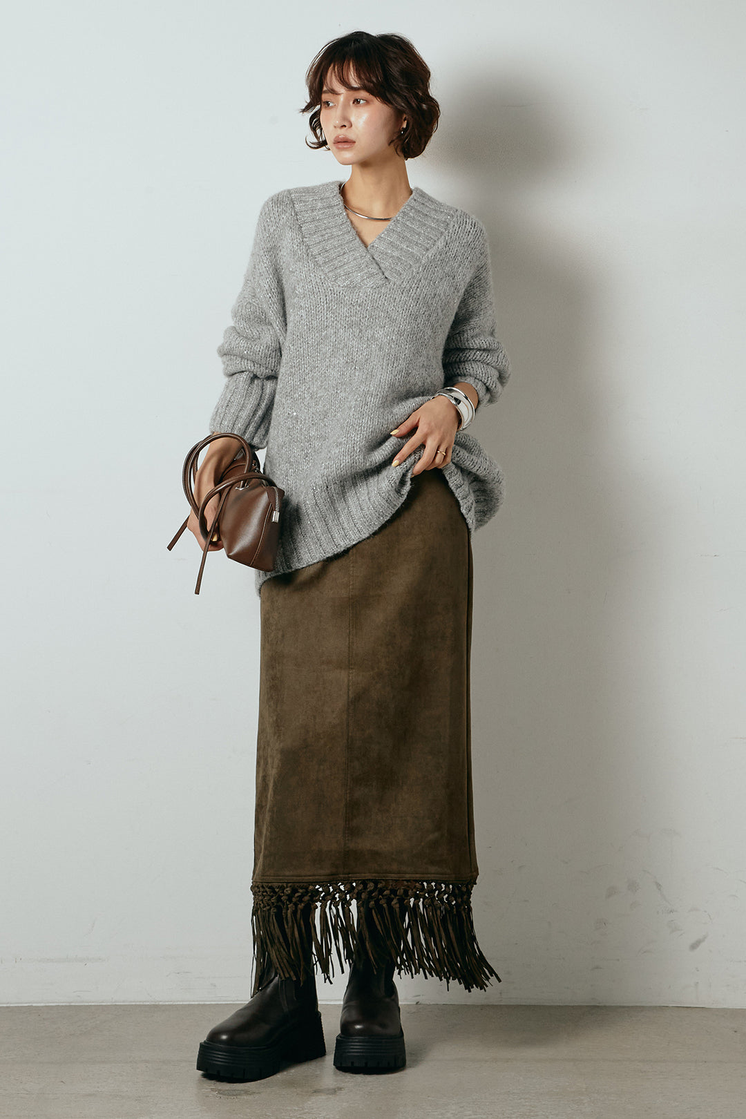 [SET]Vネックラメニットトップス+スウェードライク裾フリンジスカート(2set)
