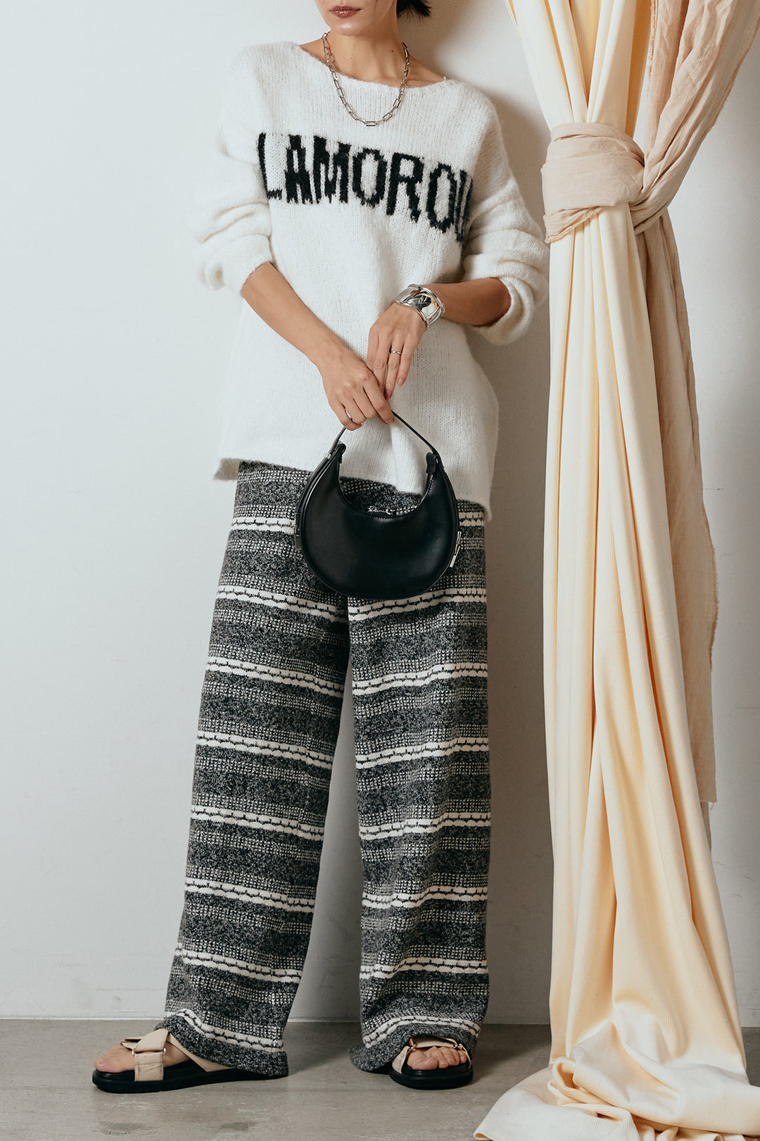 [SET]フロントロゴデザインニットトップス+マルチライン柄リラックスニットパンツ(2set)