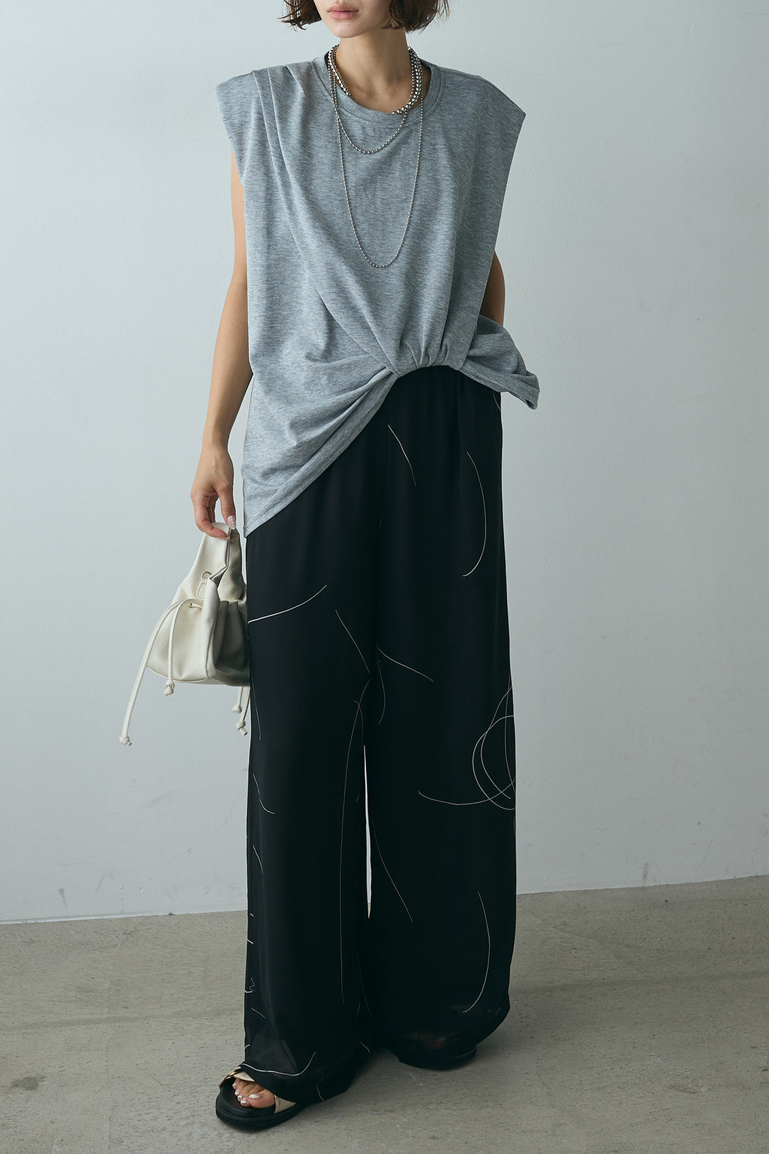 [SET]ノースリーブフロントツイストTシャツ+ニュアンスライン柄ワイドパンツ(2set)