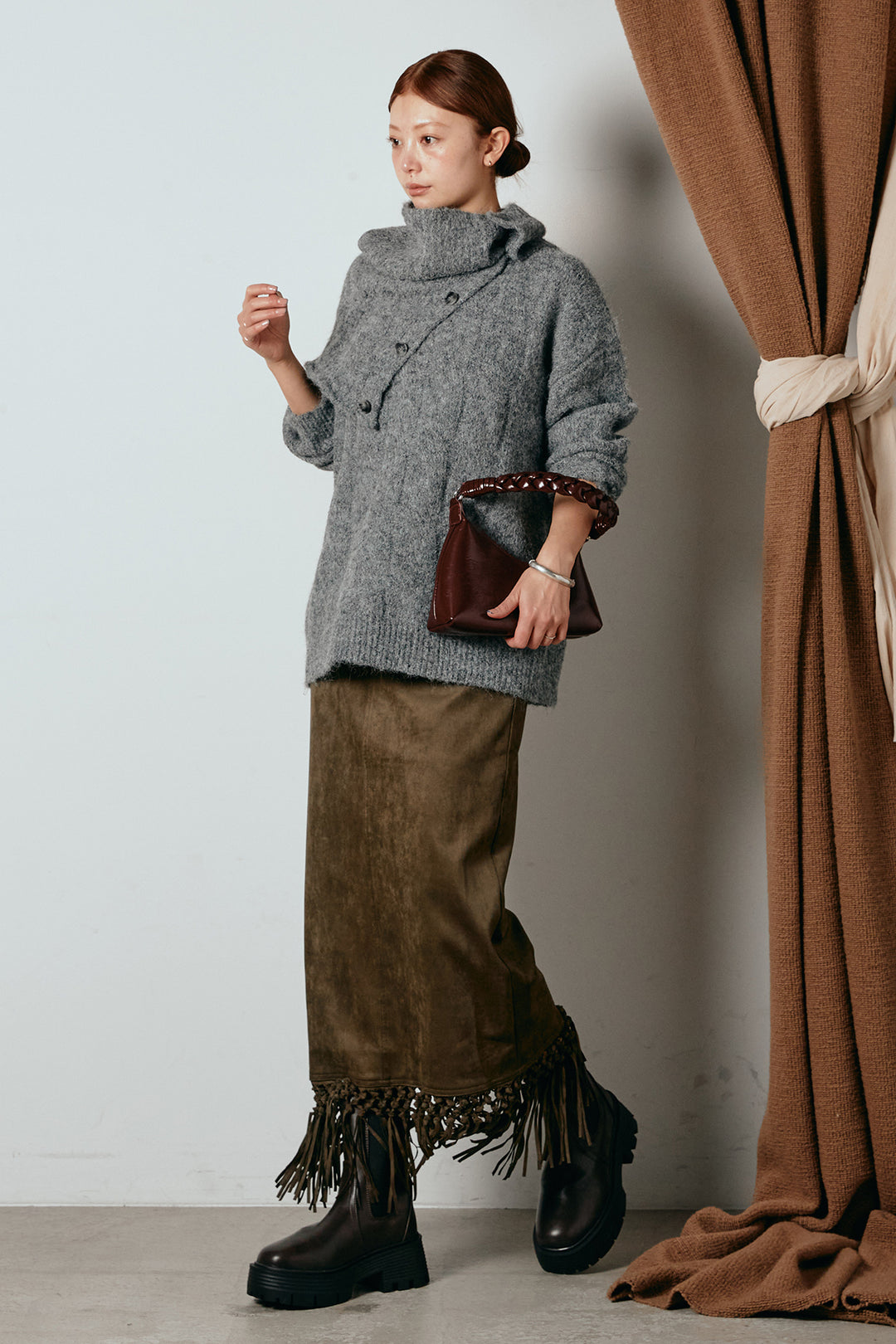 [SET]ケープデザインケーブルニットトップス+スウェードライク裾フリンジスカート(2set)