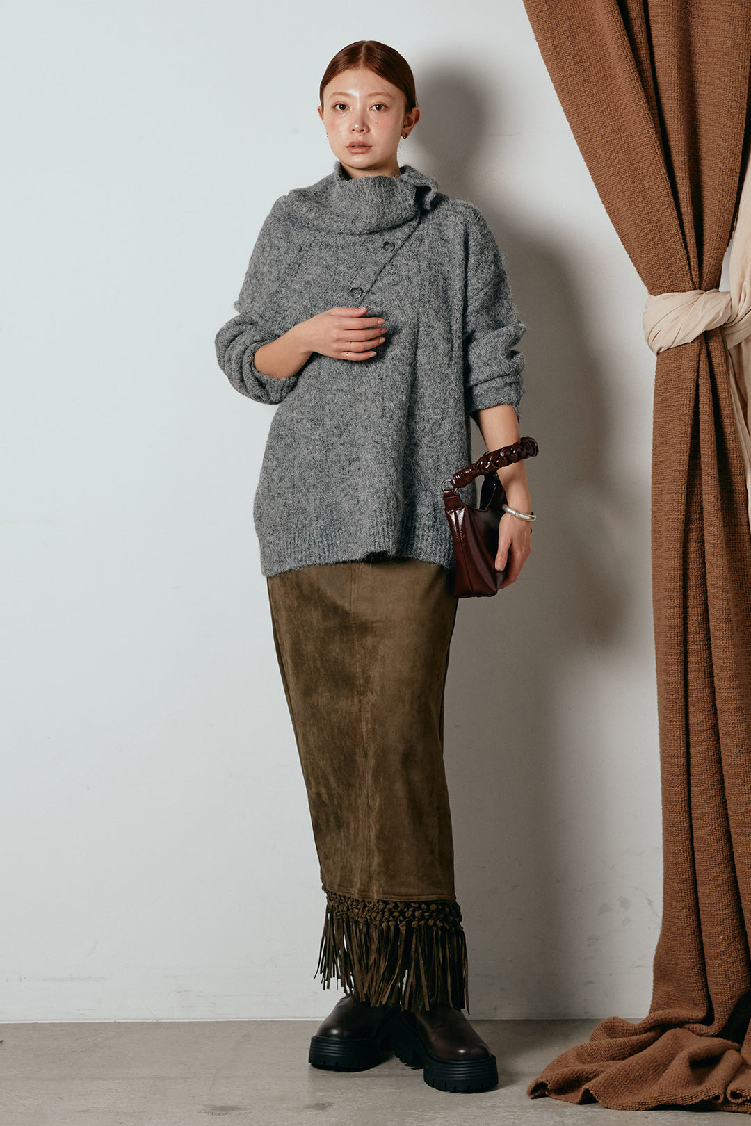 [SET]ケープデザインケーブルニットトップス+スウェードライク裾フリンジスカート(2set)