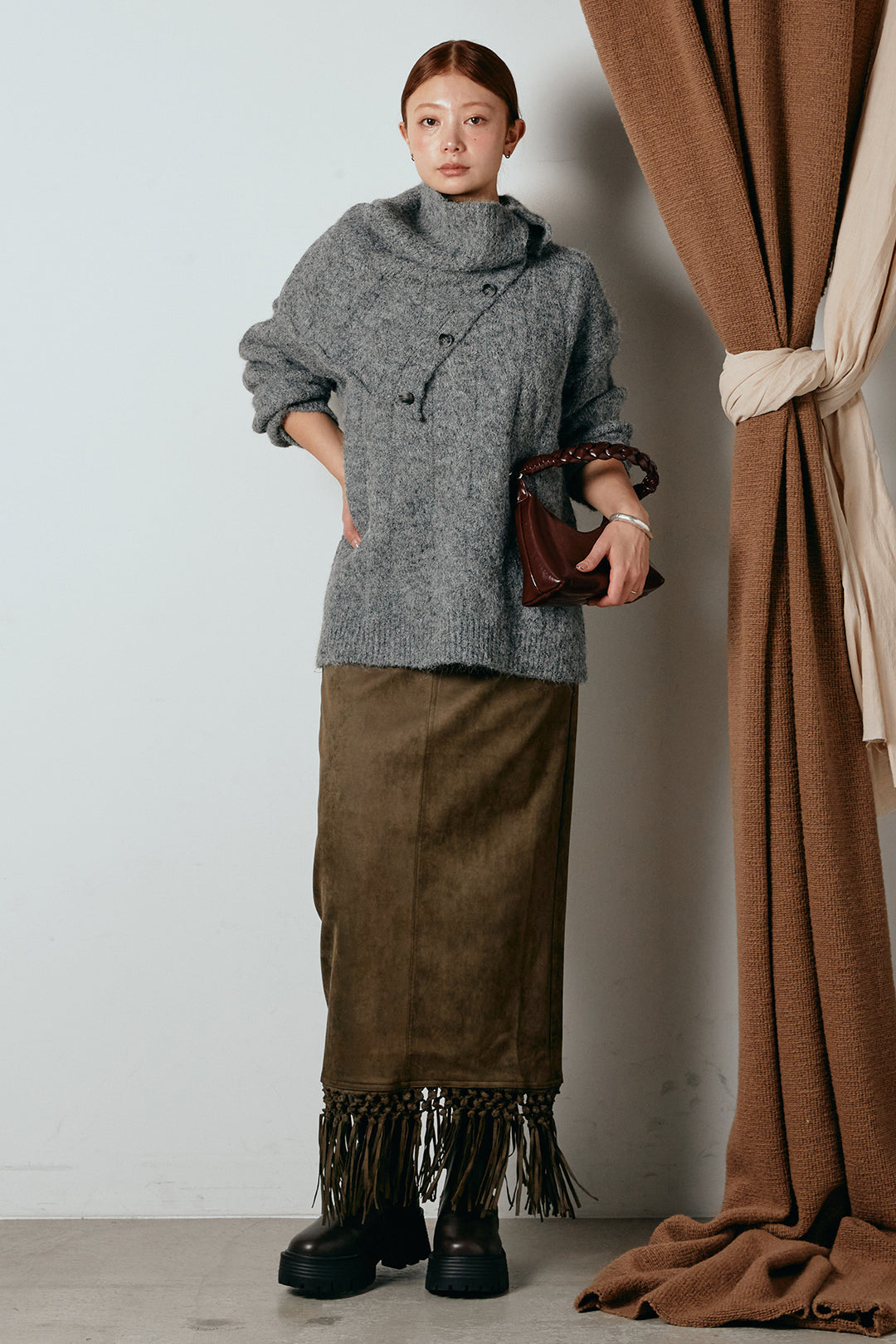 [SET]ケープデザインケーブルニットトップス+スウェードライク裾フリンジスカート(2set)