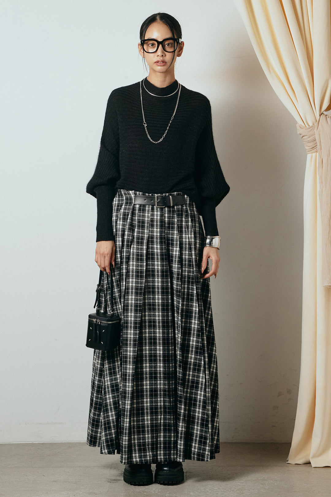 [SET]ポンチョシルエット透かしニットトップス+ベルト付きタータンチェックプリーツスカート(2set)