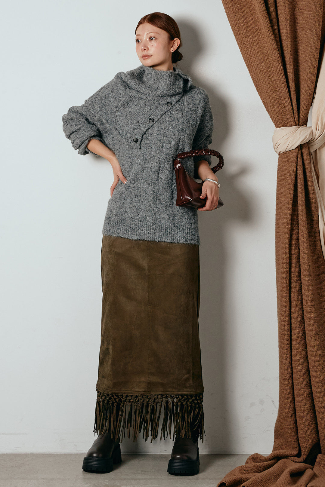 [SET]ケープデザインケーブルニットトップス+スウェードライク裾フリンジスカート(2set)