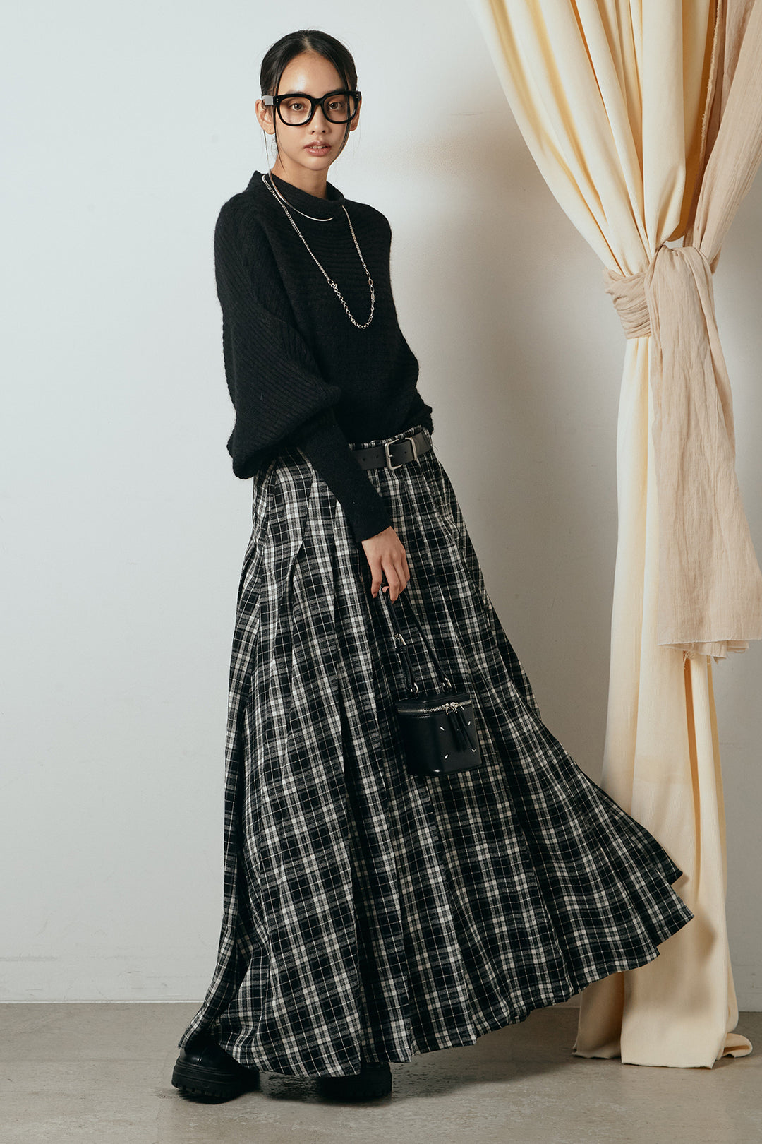[SET]ポンチョシルエット透かしニットトップス+ベルト付きタータンチェックプリーツスカート(2set)
