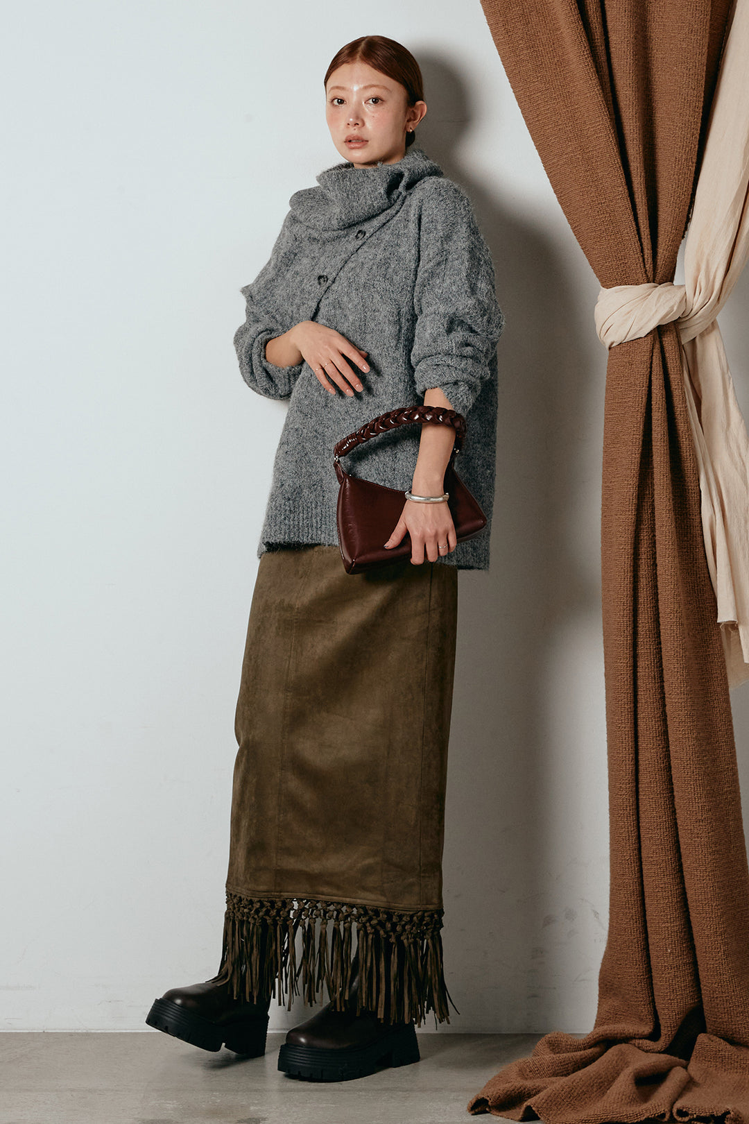 [SET]ケープデザインケーブルニットトップス+スウェードライク裾フリンジスカート(2set)