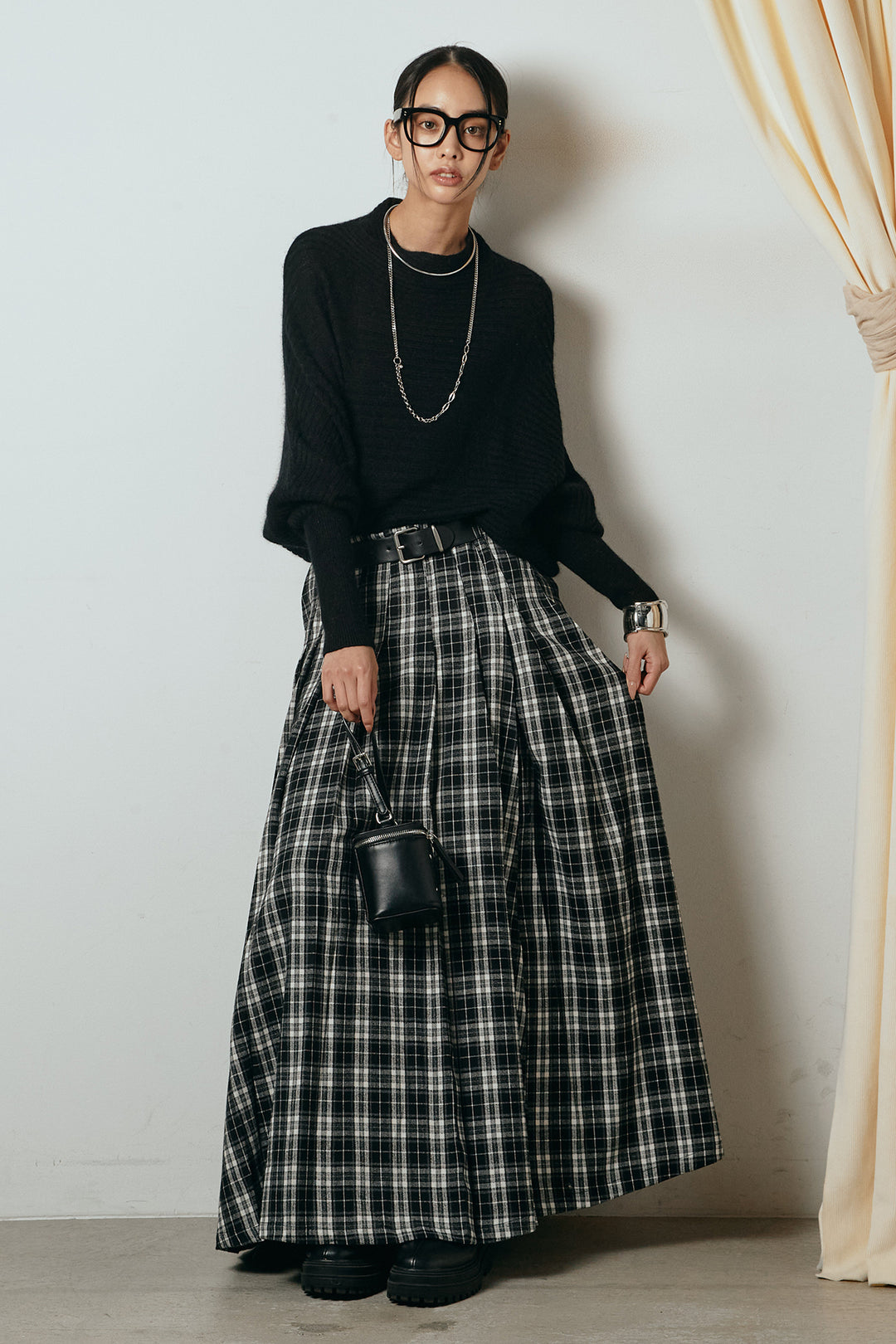 [SET]ポンチョシルエット透かしニットトップス+ベルト付きタータンチェックプリーツスカート(2set)