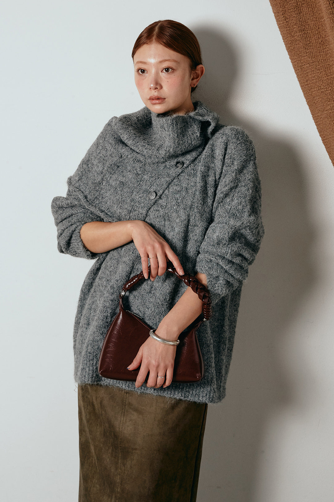 [SET]ケープデザインケーブルニットトップス+スウェードライク裾フリンジスカート(2set)