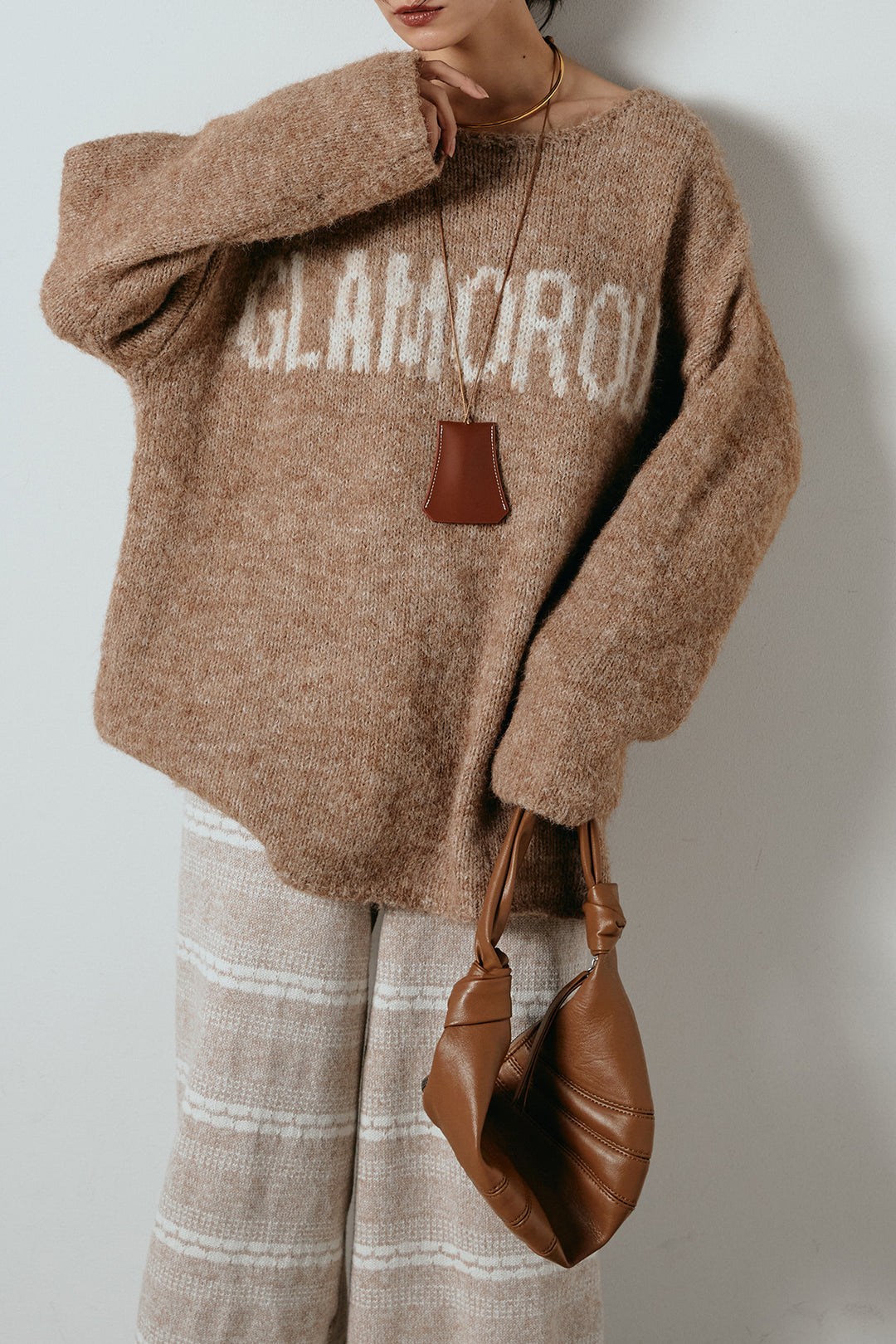 [SET]フロントロゴデザインニットトップス+マルチライン柄リラックスニットパンツ(2set)