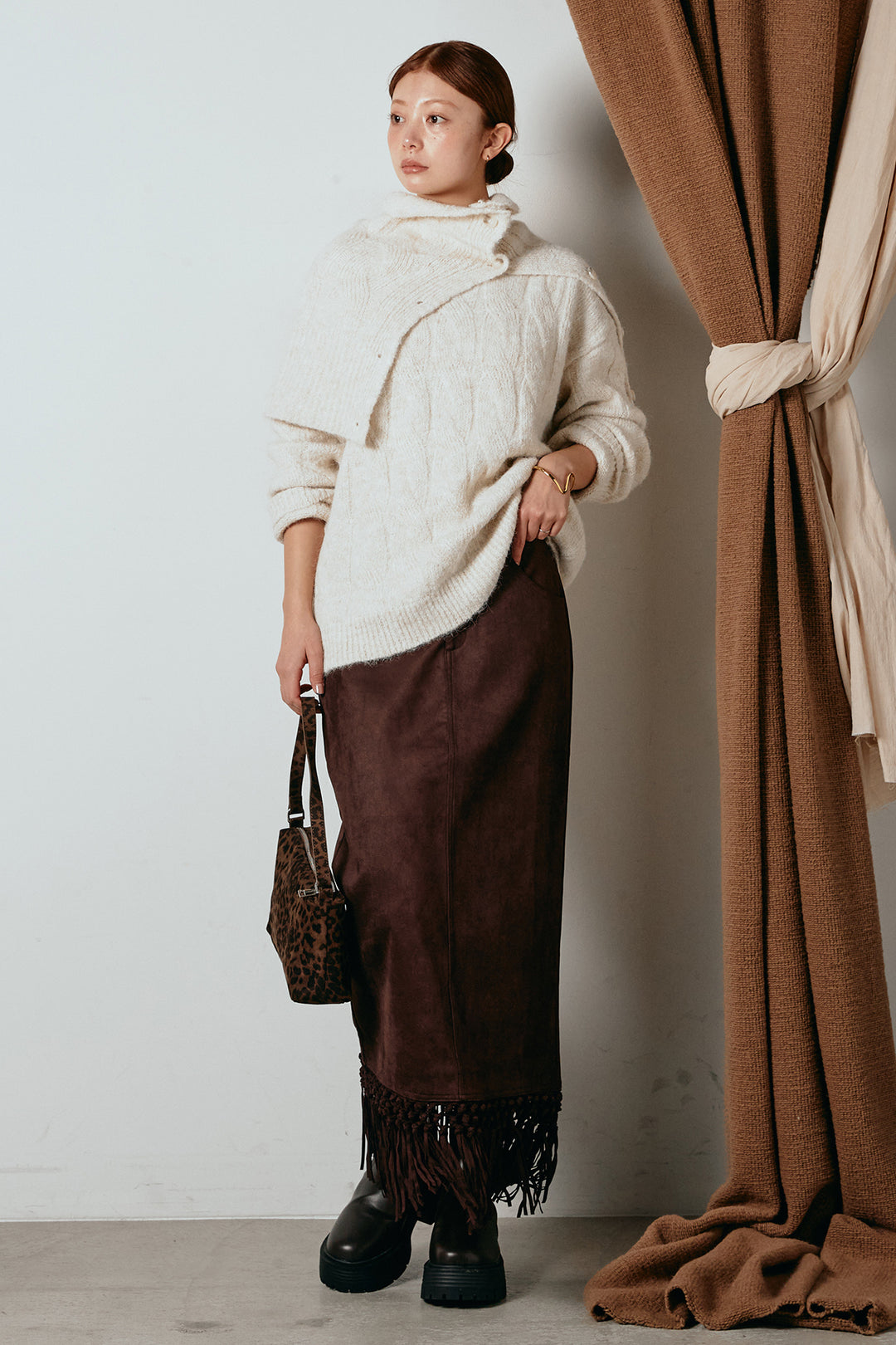 [SET]ケープデザインケーブルニットトップス+スウェードライク裾フリンジスカート(2set)