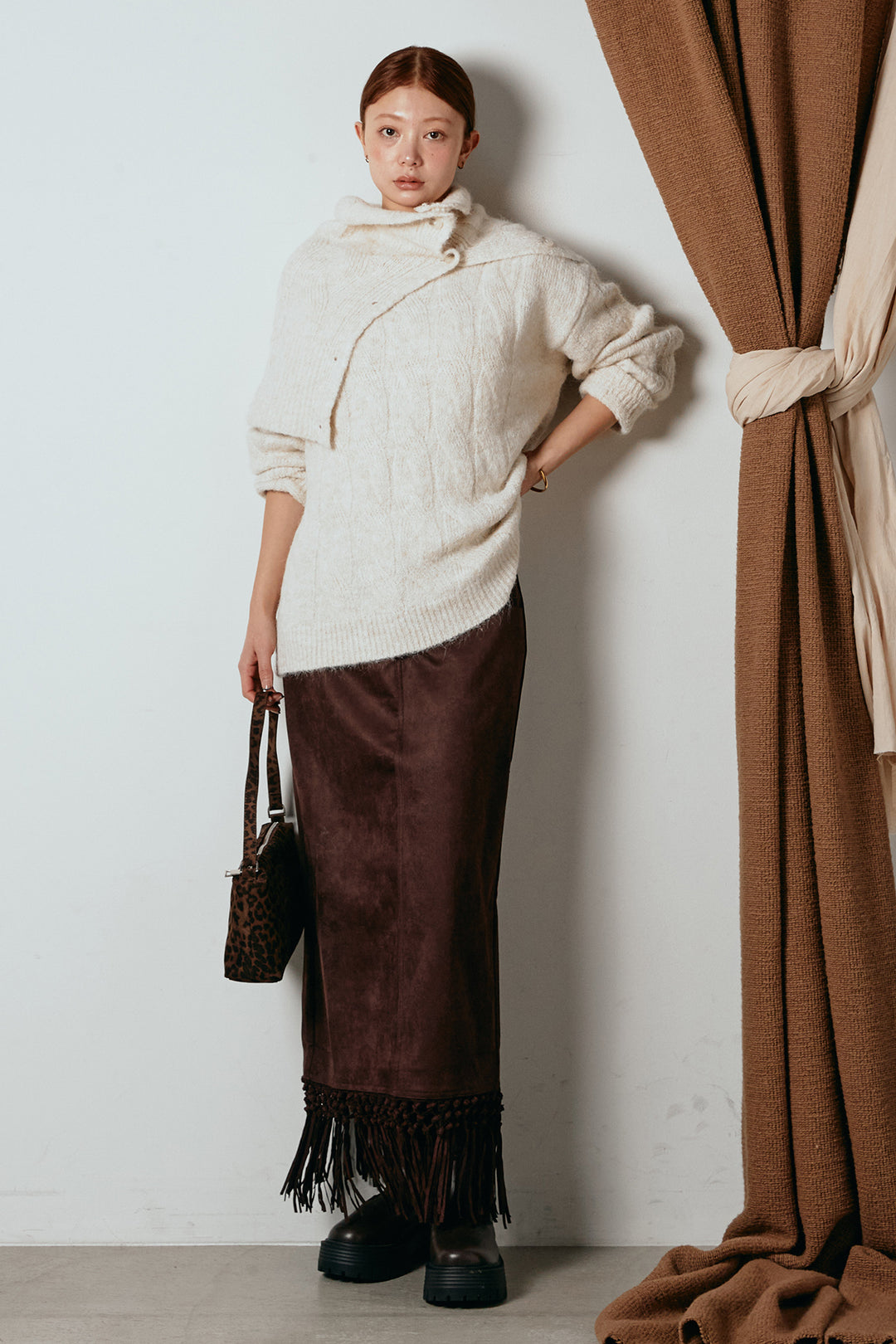 [SET]ケープデザインケーブルニットトップス+スウェードライク裾フリンジスカート(2set)