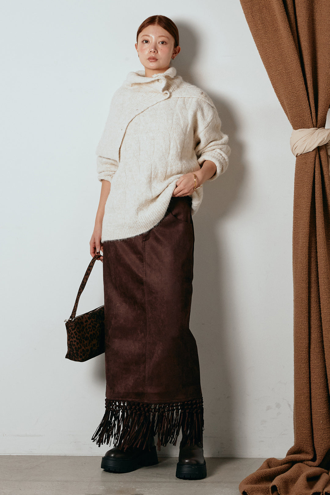 [SET]ケープデザインケーブルニットトップス+スウェードライク裾フリンジスカート(2set)