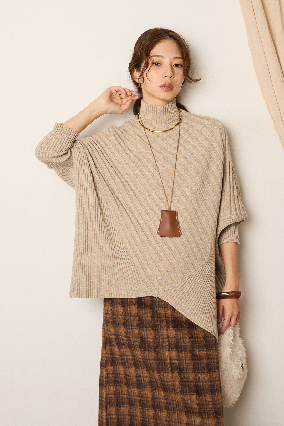 アシメデザインリブポンチョニットトップス