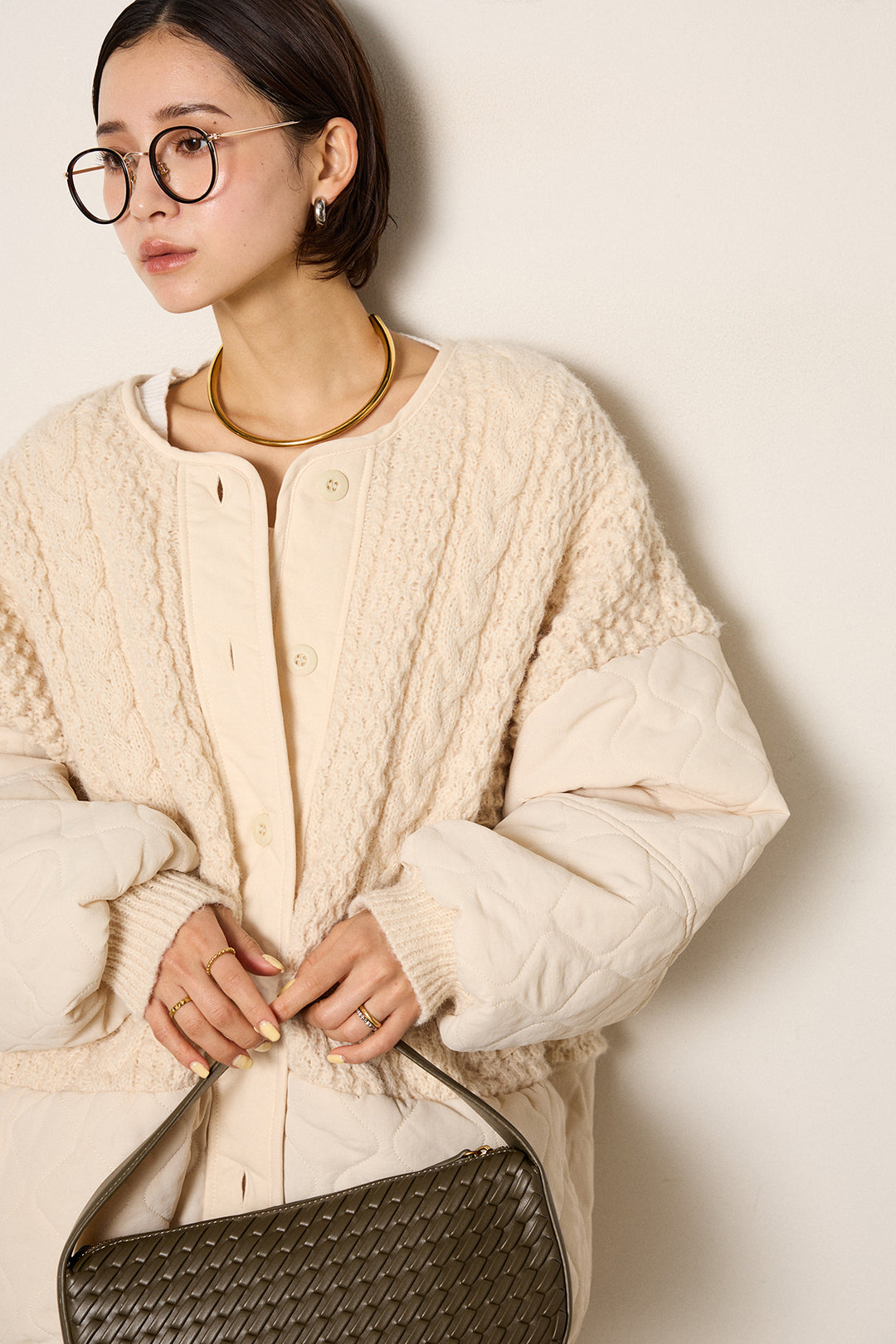 アラン編みニットノーカラー裾キルティングブルゾン