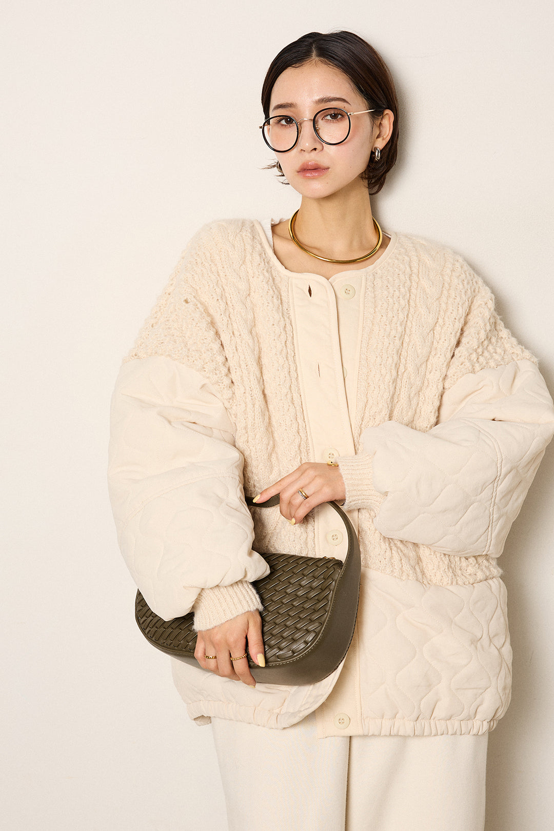 アラン編みニットノーカラー裾キルティングブルゾン