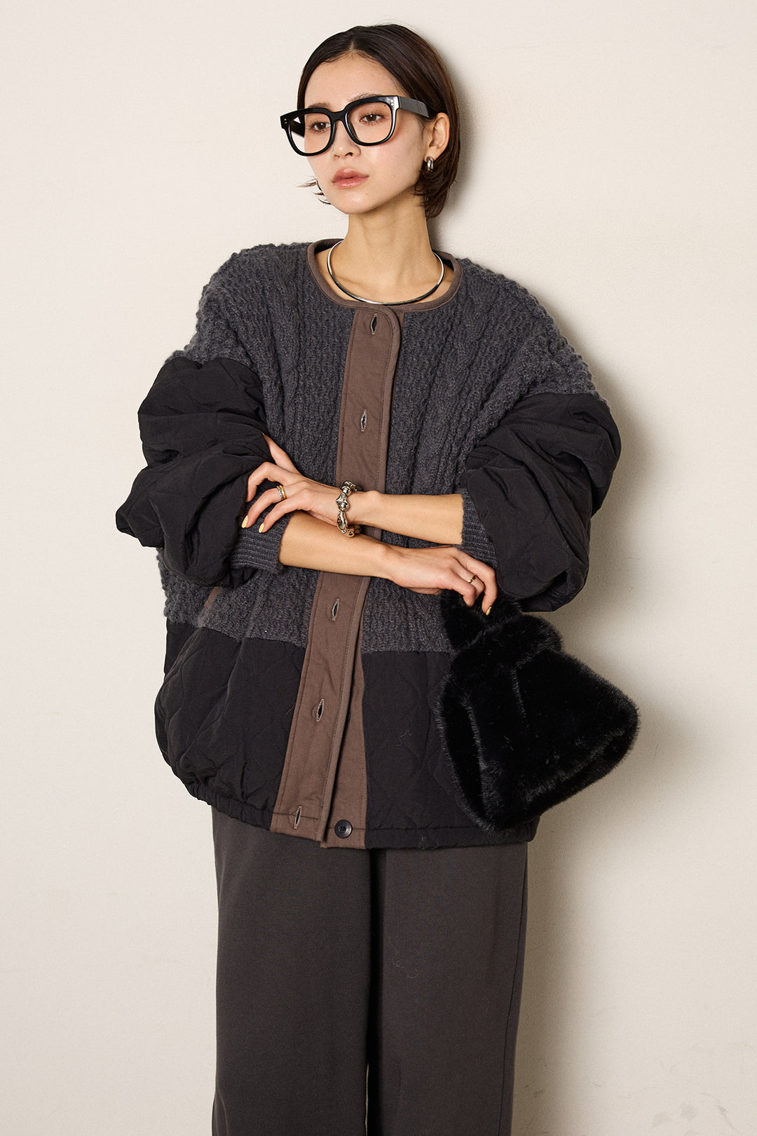 アラン編みニットノーカラー裾キルティングブルゾン