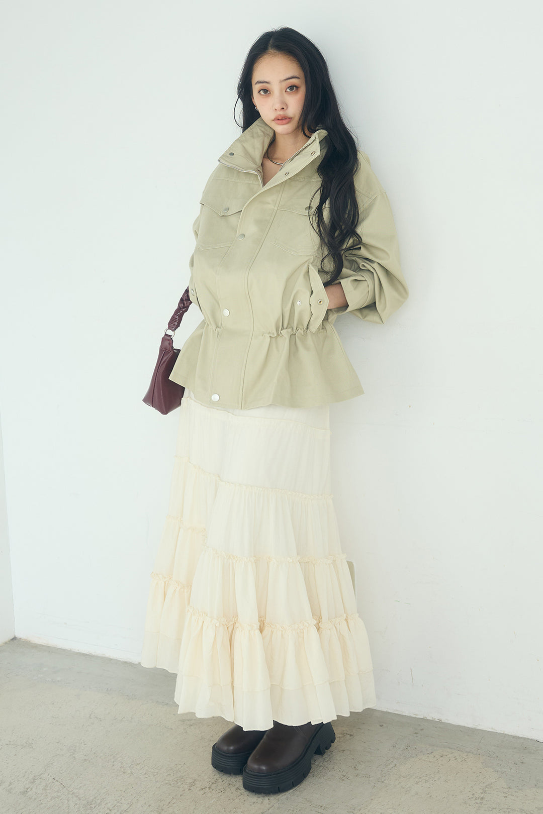 スタンドネックサイド絞りアウター