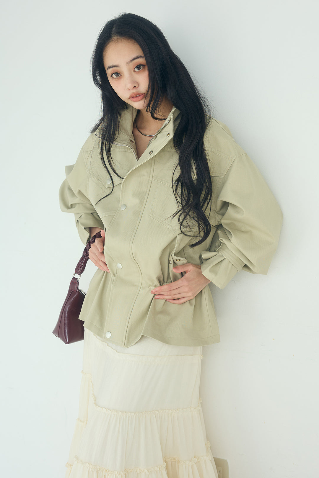 スタンドネックサイド絞りアウター