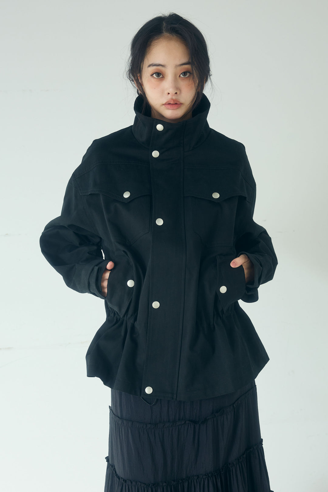 スタンドネックサイド絞りアウター