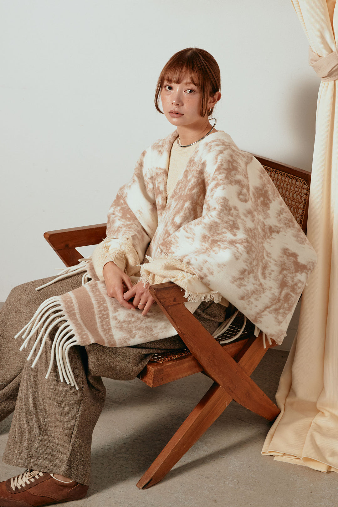 裾フリンジジャガード柄ポンチョアウター/アイボリー