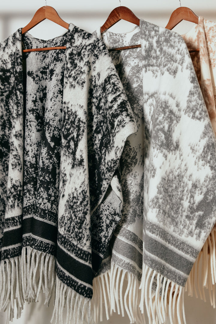 裾フリンジジャガード柄ポンチョアウター/アイボリー