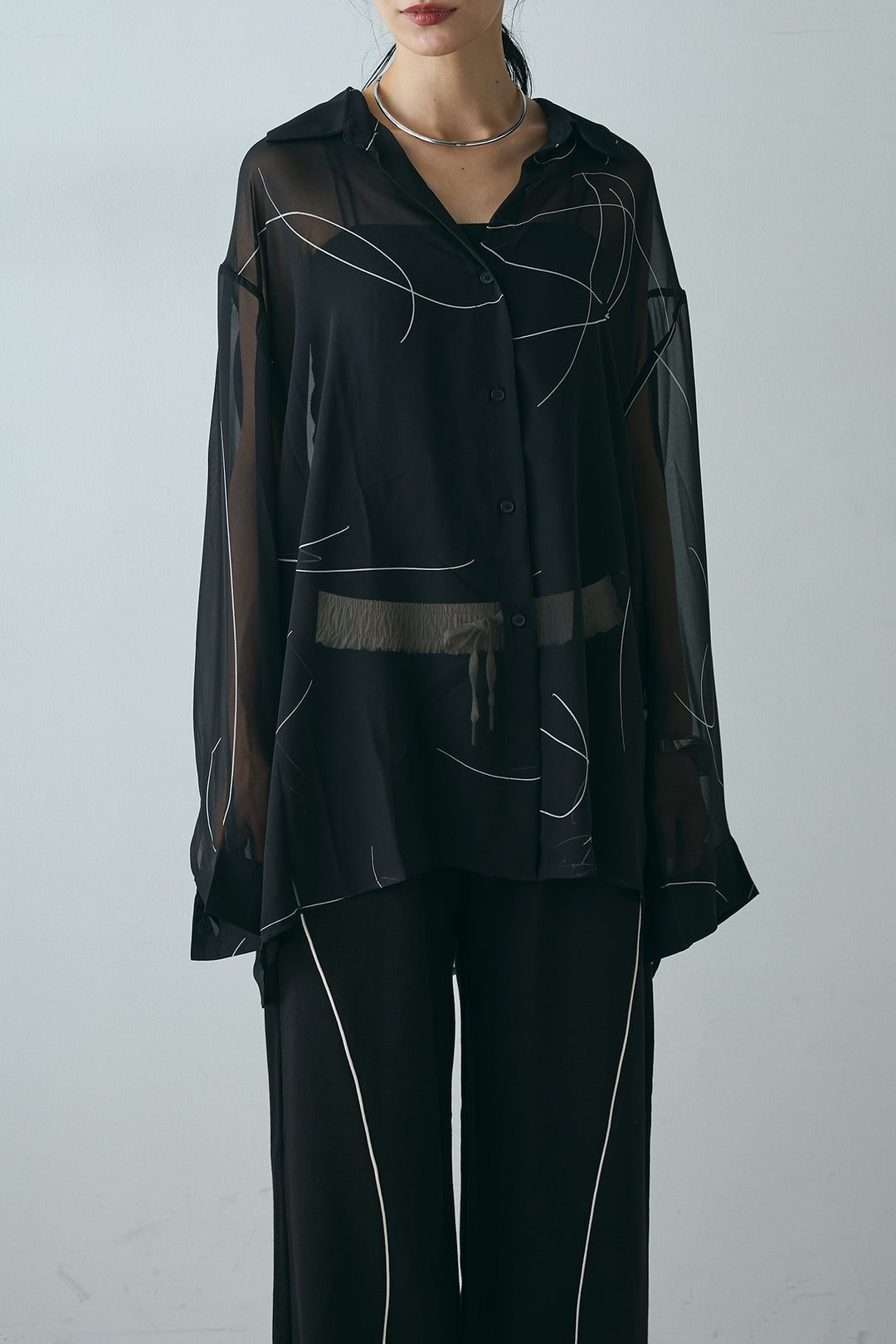 ニュアンスライン柄シアーシャツ