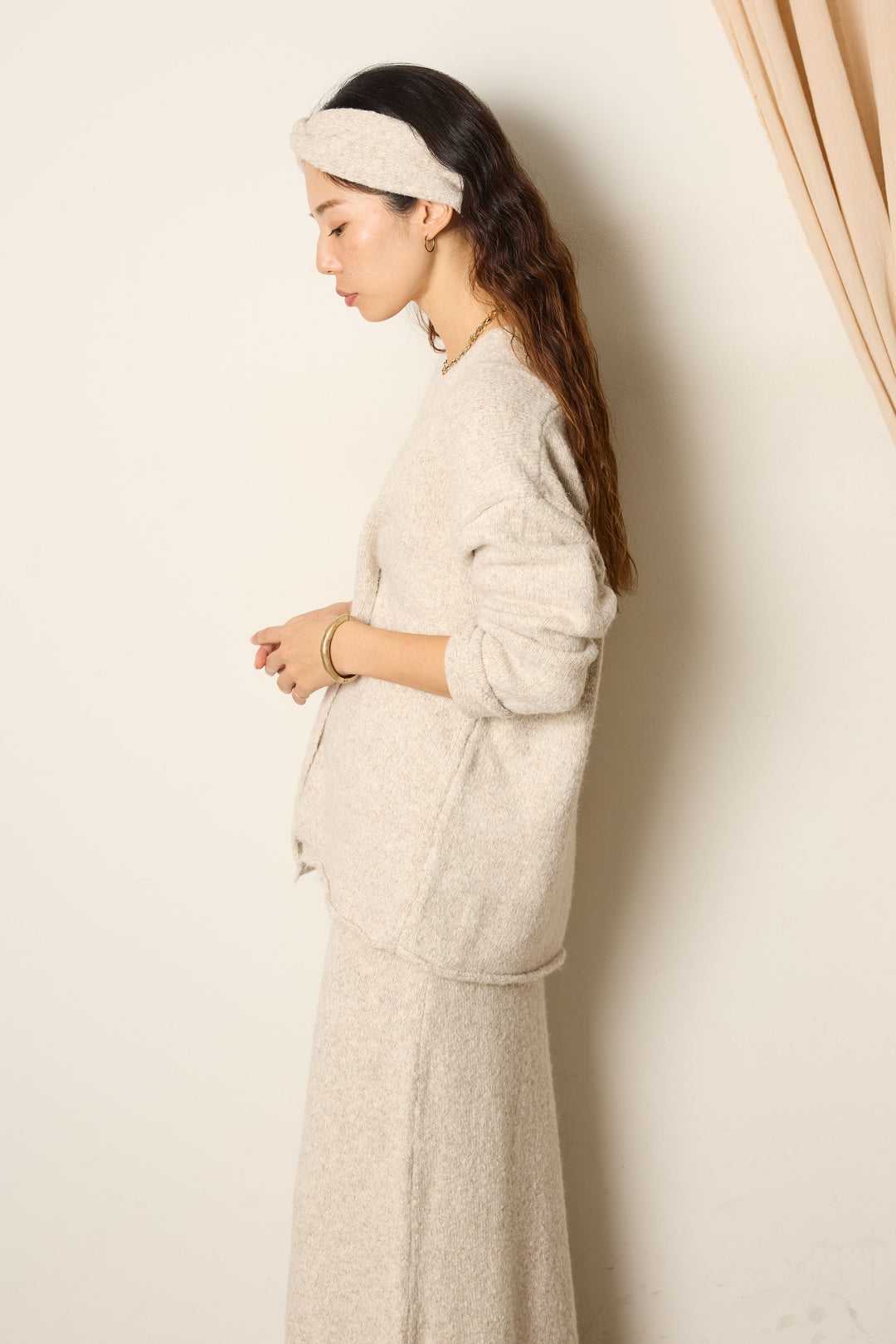 ヘアバンド付きクロスデザインミックスニットトップス