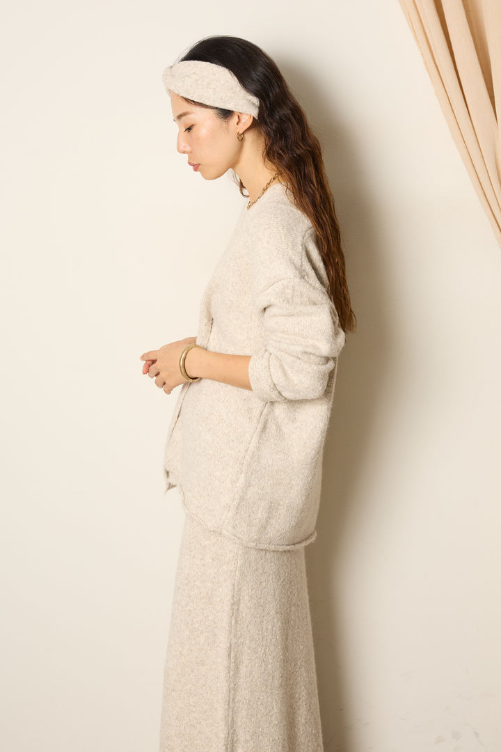 ヘアバンド付きクロスデザインミックスニットトップス