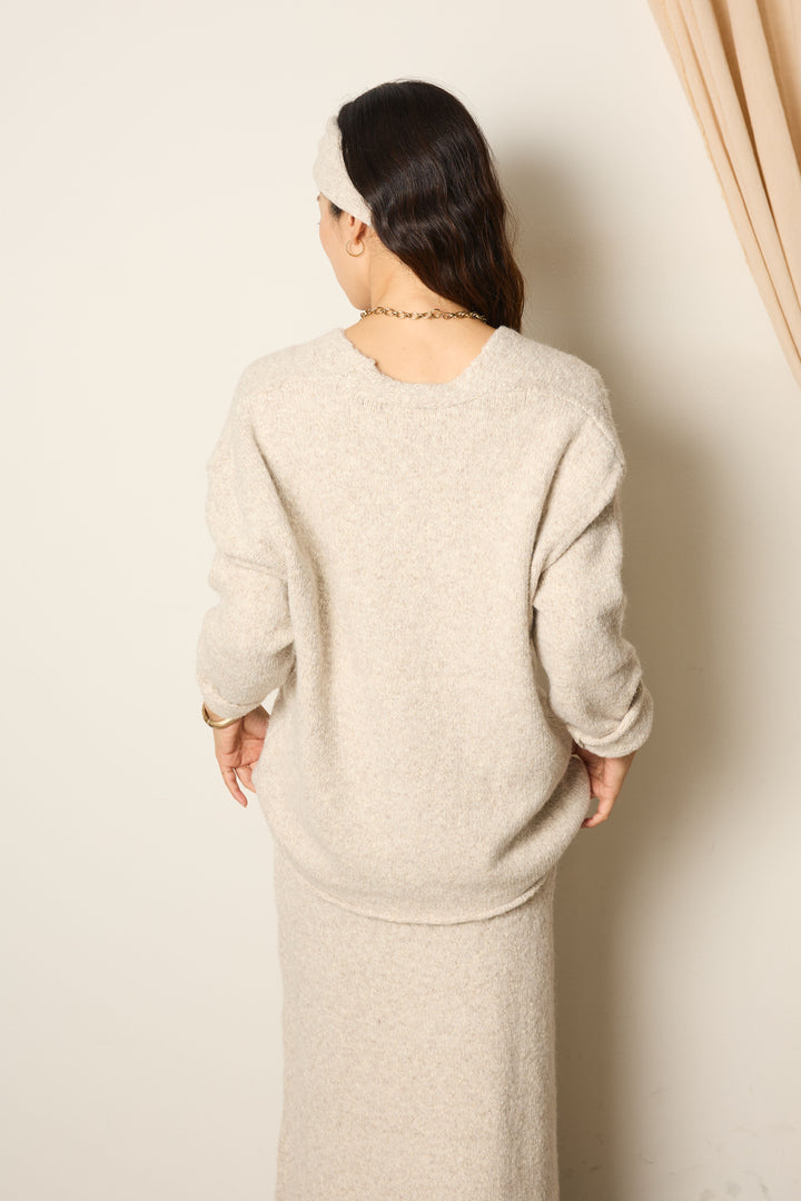 ヘアバンド付きクロスデザインミックスニットトップス