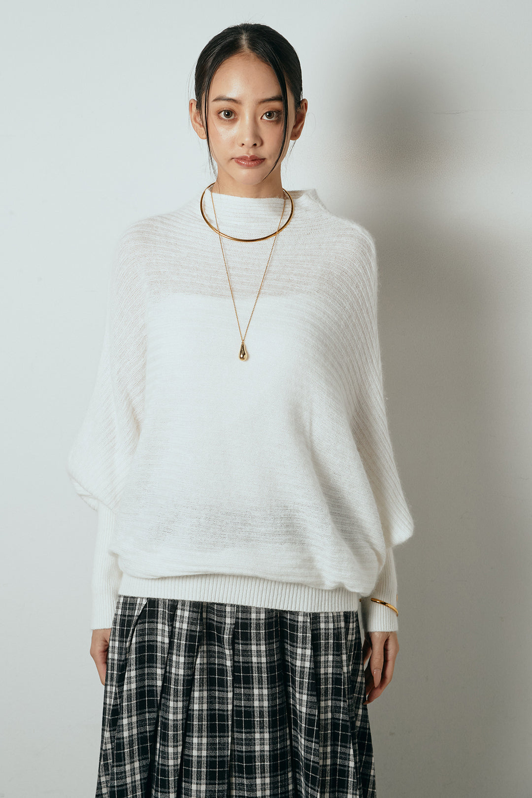 [SET]ポンチョシルエット透かしニットトップス+ベルト付きタータンチェックプリーツスカート(2set)