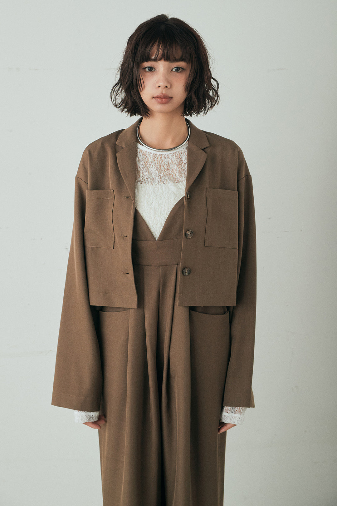 バックジップデザインショートツイルジャケット