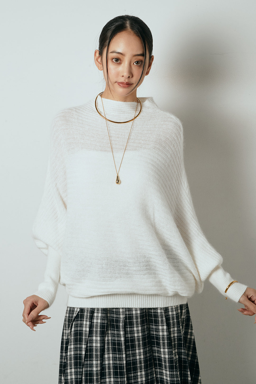 [SET]ポンチョシルエット透かしニットトップス+ベルト付きタータンチェックプリーツスカート(2set)