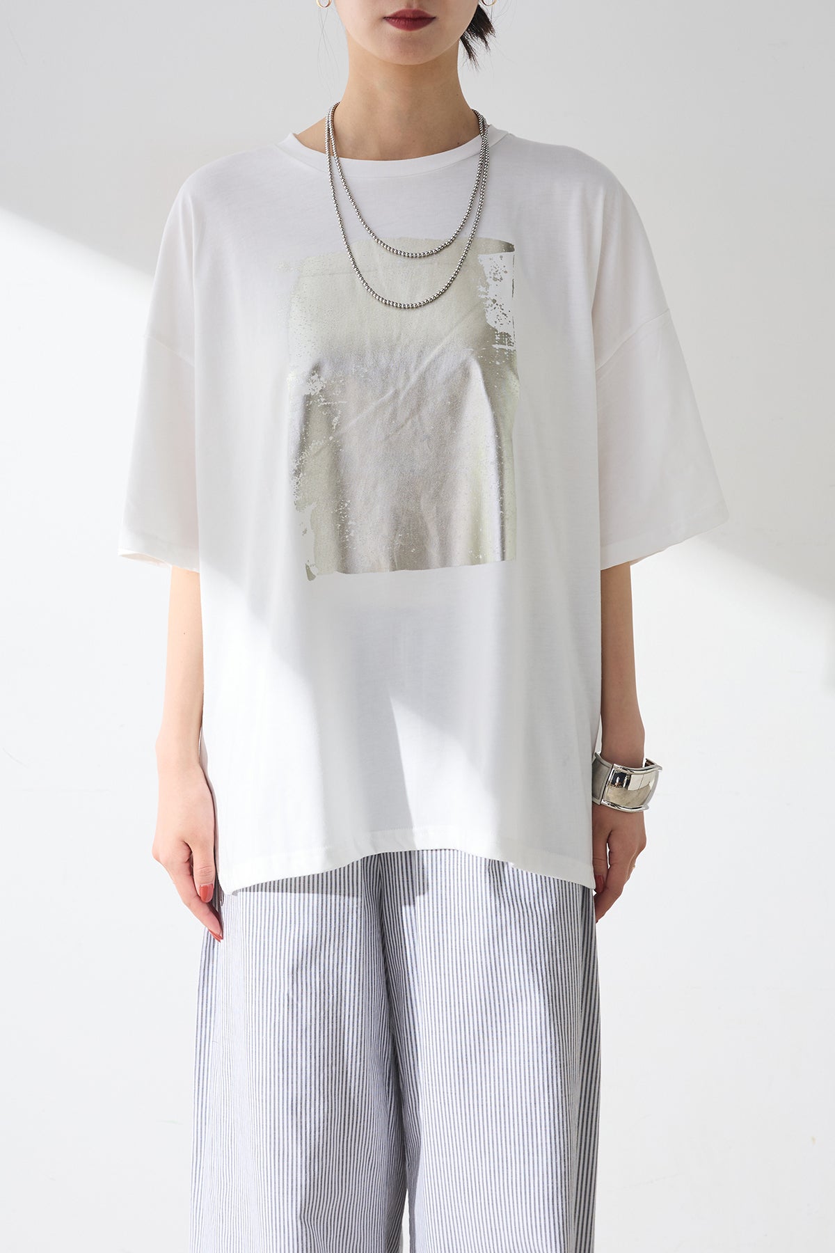[SET]箔プリントBIGTシャツ+レイヤードデニム裾フレアパンツ(2set) SET]箔プリントBIGTシャツ+レイヤードデニム裾フレアパンツ(2set