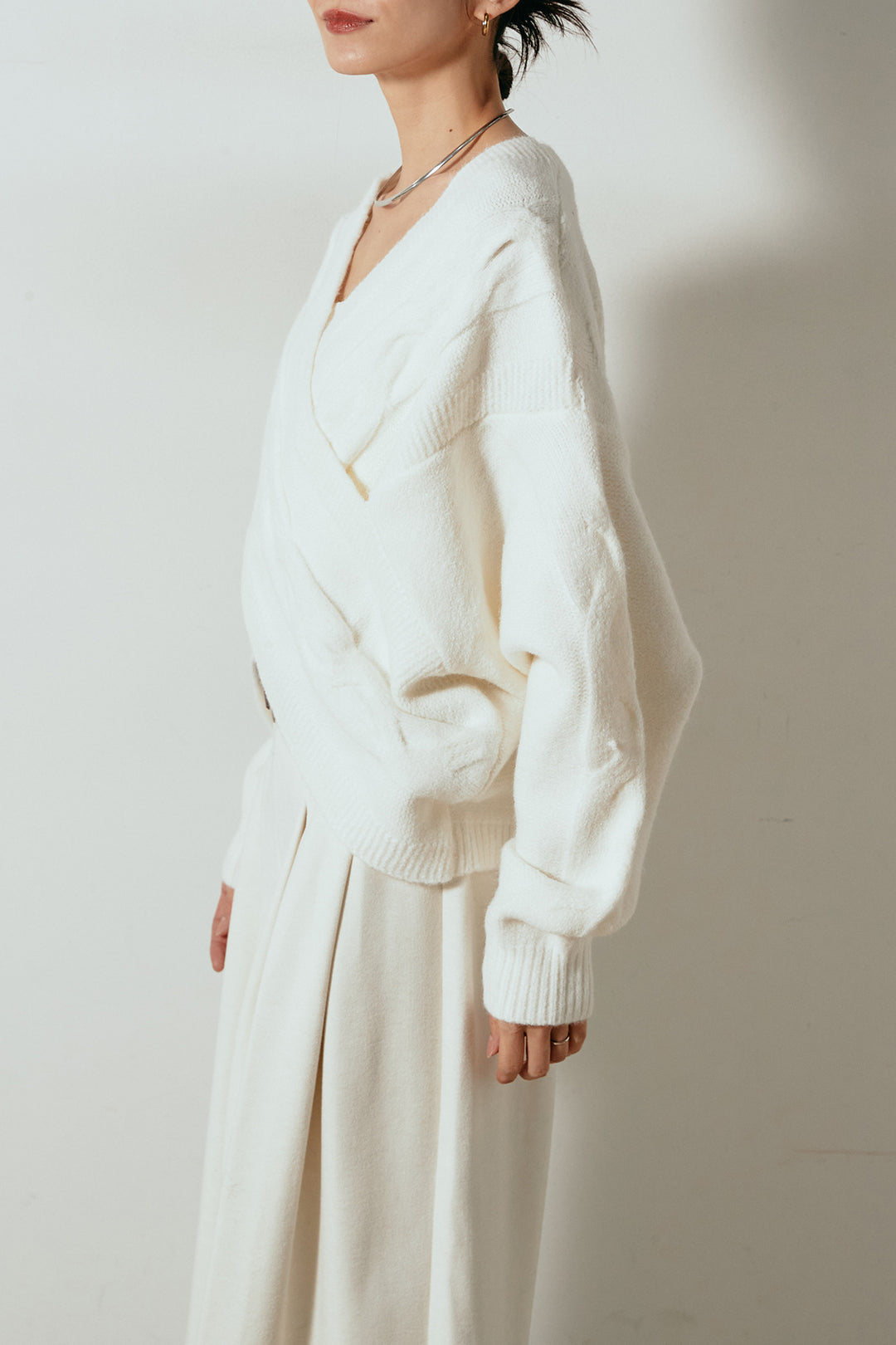 ケーブルカシュクールニットトップス