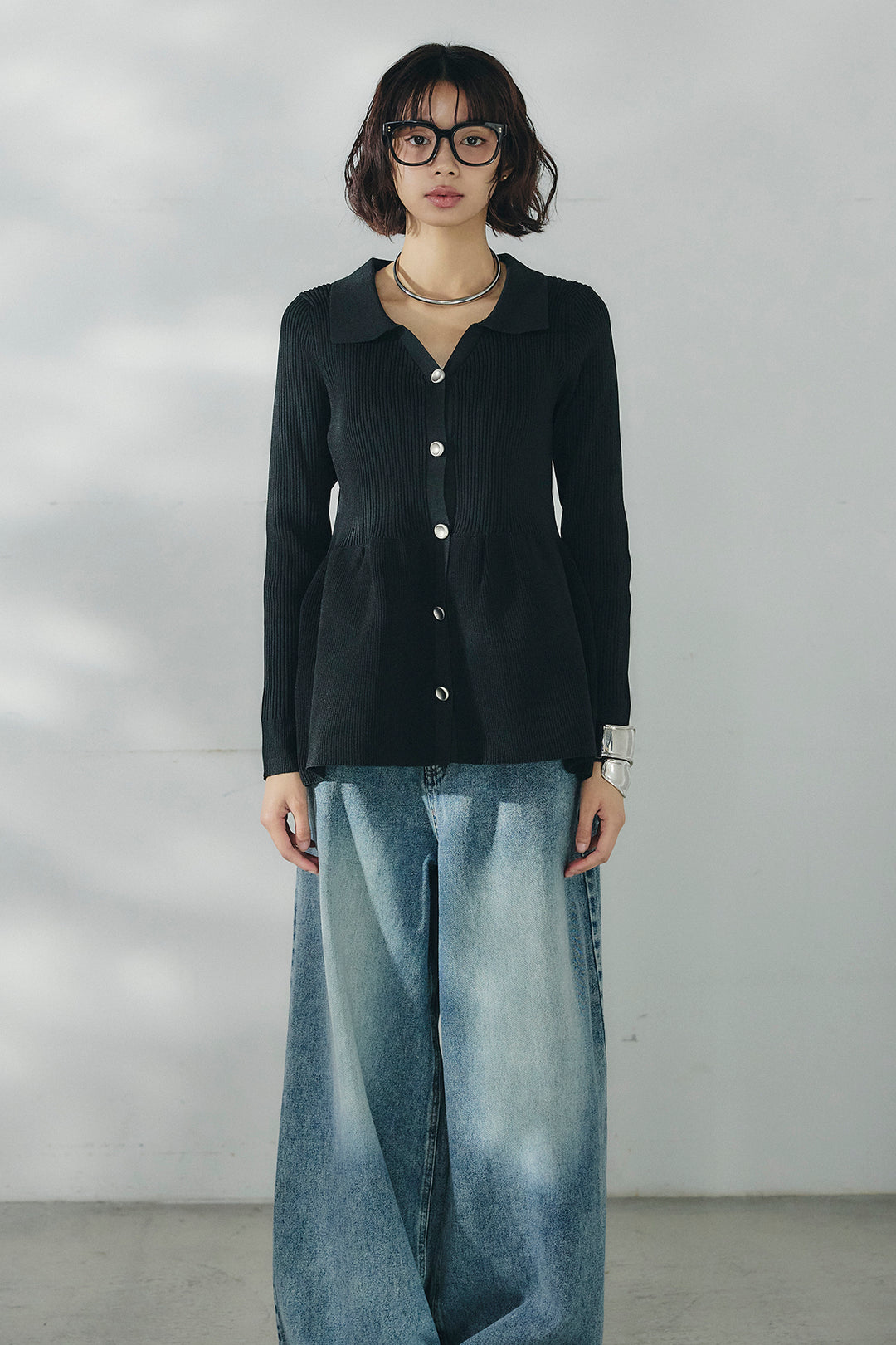 スキッパーペプラムニット