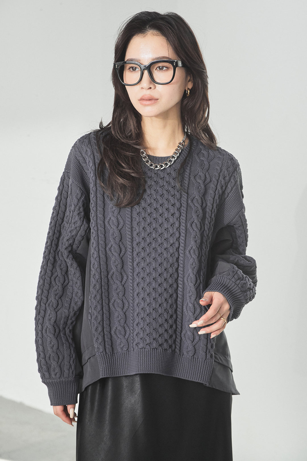 異素材ドッキングケーブルニット