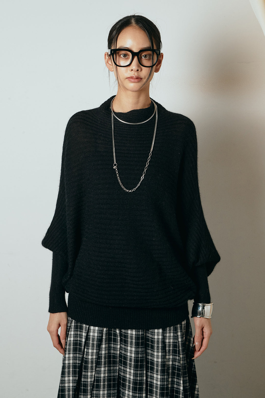 [SET]ポンチョシルエット透かしニットトップス+ベルト付きタータンチェックプリーツスカート(2set)