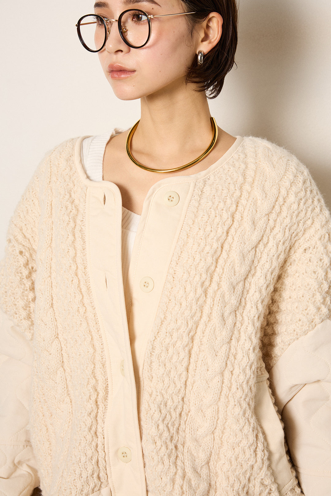 アラン編みニットノーカラー裾キルティングブルゾン