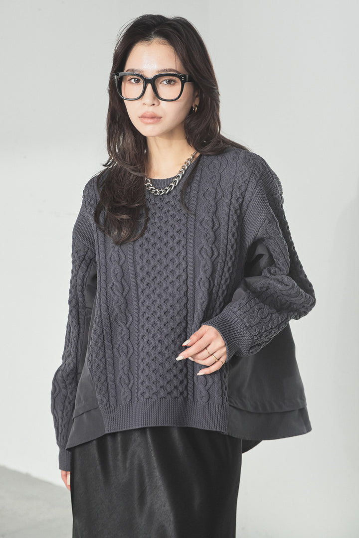 異素材ドッキングケーブルニット