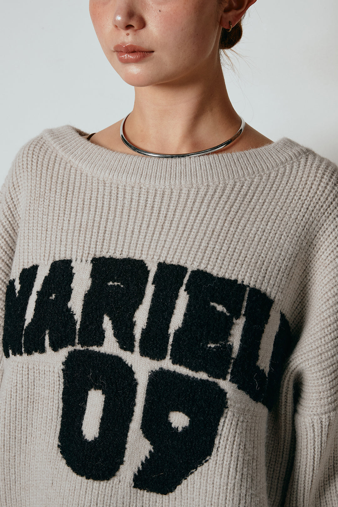 ロゴジャガードニットトップス