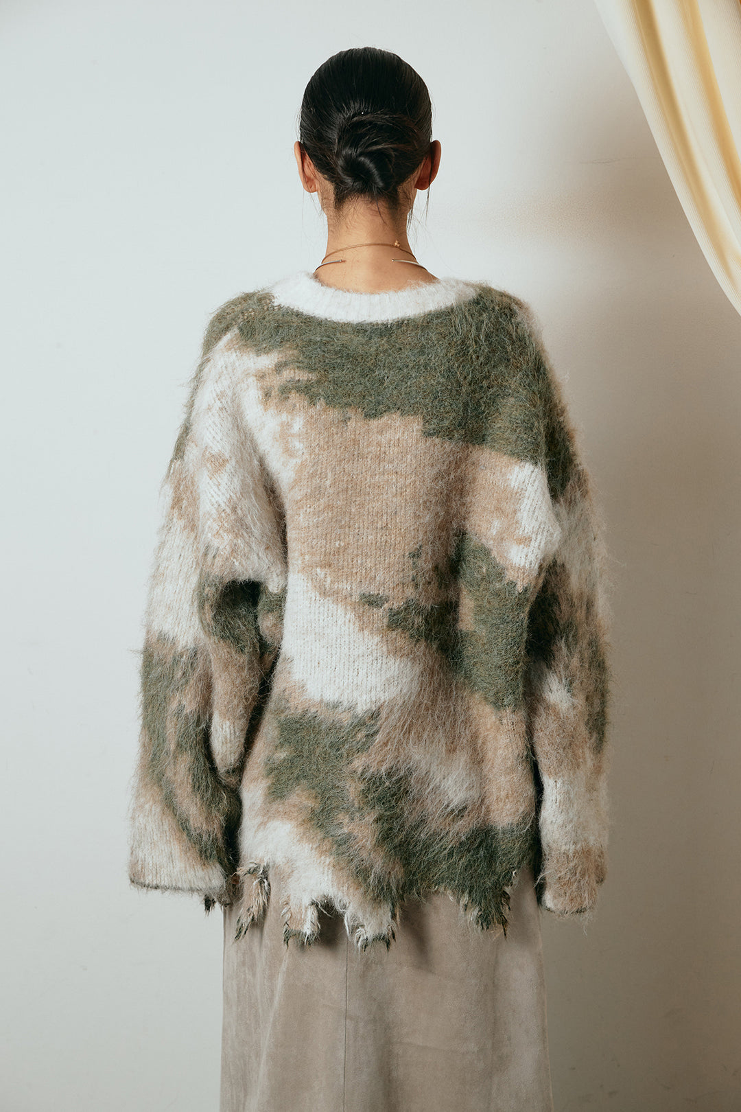 起毛裾デザインニュアンス柄ニットトップス